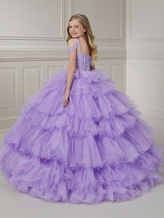 Your sweet girl will light up the room in this beaded long cold shoulder dress with A-line ruffled tulle skirt by Tiffany Princess 13716. This cold shoulder gown features a square neckline with beaded embellishments, floor length A-line sparkle tulle skirt with ruffles, sweep train, and a lace-up back. House of Wu Tiffany Princess Collection Fall 2023 Style Number: 13716 Fabric: Beading/Sparkle Tulle Please note: There may be a loss of glitter while wearing this dress due to the nature of the fa Fabric Beading, Kid Dresses, Grammar Notes, Birthday Shoes, Back House, Cold Shoulder Gown, Skirt With Ruffles, Beaded Embellishments