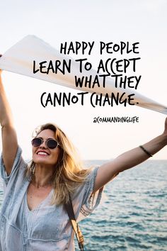 a woman holding up a scarf with the words happy people learn to accept what they cannot change