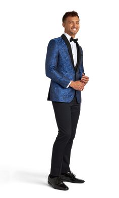 This royal blue paisley tuxedo coat with a shawl lapel is a fun look for a party or formal event where you want to bring style.  Add black or blue pants to this blue tuxedo and dress it up with a bow tie or dress it down without any tie, but maybe just a pocket square. Semi-formal Notch Lapel Blazer For Gala, Classic Notch Lapel Suit For Gala, Festive Tuxedo Blazer For Formal Occasions, Blue Notch Lapel Blazer For Party, Elegant Fitted Blue Tuxedo, Elegant Holiday Formal Blazer, Royal Tailored Suit For Formal Occasions, Tailored Party Suits With Shawl Collar, Party Tuxedo With Shawl Collar