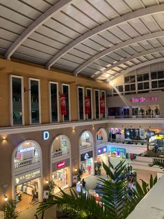 an overhead view of a shopping mall filled with people