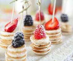 mini pancakes with strawberries and whipped cream