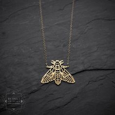 Moth necklace – This Death moth necklace geometric style is the ultimate jewelry piece to show off your love of this unique insect while staying in style. This necklace is bound to become a staple in your outfit of the day. ★ Comes in our signature box, ready for gift giving. ★ Available in Gold ... Goat Jewelry, Bug Necklace, Bug Gifts, Moth Necklace, Insect Necklace, Origami Necklace, Jewelry Design Studio, Egyptian Necklace, Butterfly Necklace Gold