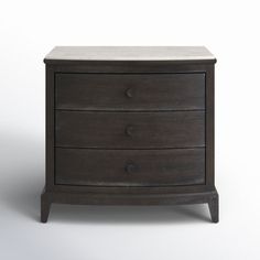 an image of a wooden dresser with marble top