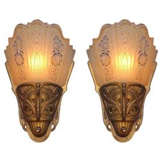 pair of art deco sconces with glass shades