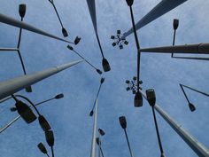 looking up into the sky at many street lights