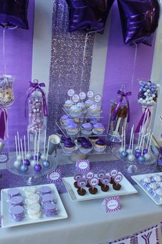 purple and white dessert table at a birthday party