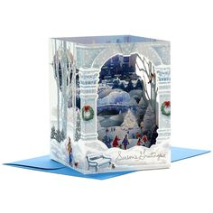 a christmas card with an image of a winter scene