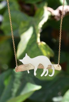 White cat on a swing pendant, Statement necklace, Pet lovers gift, Gift for a cat lover, love for pets, Short necklace, pet lover necklace, acrylic cat pendant, black kitten, cute cat necklace, crazy cat lady gift, original gift for her. This adorable, statement necklace is made with laser cut technique from Acrylic (plexiglass) and brass.  The cat necklace started as an original drawing of mine and was then transformed into this whimsical, original necklace which I assemble myself. This necklac Crazy Cat Lady Gifts, Tiger Necklace, Gatto Carino, Lover Jewelry, Original Necklace, Cat Lady Gift, Lovers Necklace, Daughter Jewelry, Cat Pendant