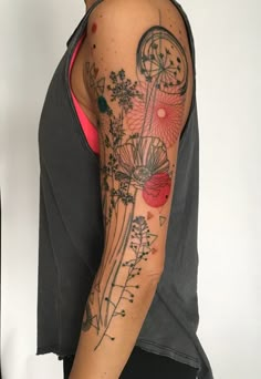 a woman with a tattoo on her arm