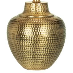 a gold vase is shown on a white background and it looks like it could be used as an urn