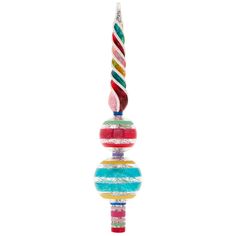 a multicolored candle hanging from a string