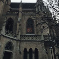 an old church building with gothic architecture