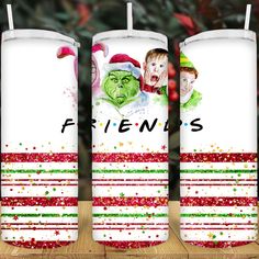 three christmas candles with the words friends on them and two children in santa's hats