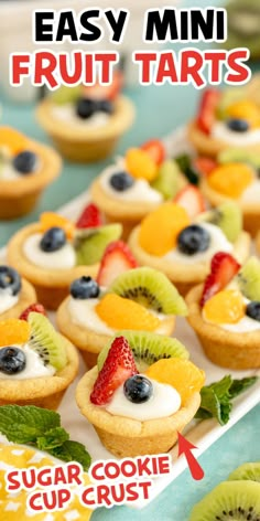 an easy mini fruit tarts recipe on a plate with kiwis and strawberries