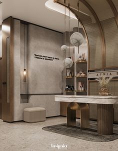 the interior of a modern kitchen with marble counter tops and gold accents on the walls