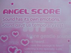 an ad for angel score with hearts and stars on the back of its advertisement board