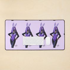 a computer mouse pad with an image of a woman in bunny ears on the keyboard