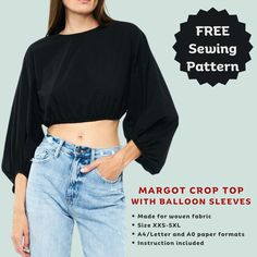 a woman wearing jeans and a crop top with the text free sewing pattern, margot crop top with balloon sleeves