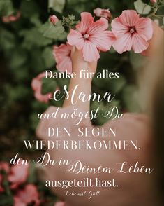 a person holding pink flowers in their hand with the words, danke fifrales e