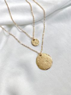 Choice of Small or Large Minimalist Gold Hammered Coin Medallion Necklace --- International Buyers: Please be familiar with your country's policies in regards to customs fees prior to purchasing overseas. Any fees/taxes are the buyer's responsibility and may be charged at the time of delivery/pick-up. This is not included in the costs here. Thank you! Gold Coin Necklaces are classic and timeless. These pieces are no exception. Select your choice of Large or Small (or both) Coin Necklace(s) at ch Necklaces Chunky, Gold Coin Necklace, Layering Necklaces, Gold Disc, Chunky Bracelets, Medallion Necklace, Hammered Gold, Disc Pendant, Trendy Necklaces