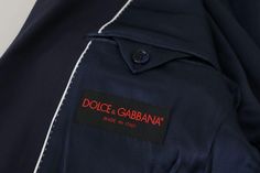 DOLCE & GABBANA Gorgeous brand new with tags 100% Authentic Dolce & Gabbana Blazer. Colour: Blue Model: Single breasted one piece formal jacket blazer coat Material: 96% Wool 4% Silk Inner Lining: 53% Cupro 47% Viscose Two front button closure Two front pockets Logo details Made in Italy Designer Long Sleeve Suit With Button Closure, Designer Suits With Button Closure, Designer Navy Blazer For Business, Designer Fitted Navy Blazer, Silk Crafts, Formal Coat, Formal Blazer, Formal Jacket, Silk Blazer