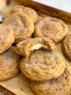 some sugary cookies are on a baking sheet