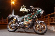 a motorcycle parked on the street at night