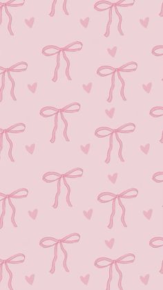 pink bows and hearts on a light pink background for valentine's day wallpaper