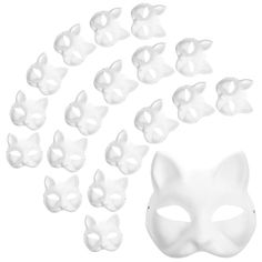 a white cat mask with many smaller masks around it