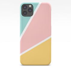 a pink, yellow and blue phone case on a white background