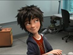 an animated character sitting at a desk in front of a computer monitor with the caption's name on it