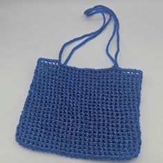 Metallic Blue Handmade Crochet Mini Shoulder Bag 🧶 Beautiful Blue Net Crochet Mini Shoulder Bag 🧶 100% Handmade products. 🧶 100% Polyester 🧶 SIZE : 21 cm x 18 cm ( Strap length: 52 cm )  * Measurements may differ by 1-2 cm. Blue Handwoven Bag As A Gift, Handwoven Blue Summer Bag, Blue Handwoven Summer Bags, Summer Blue Handwoven Bags, Handmade Blue Crochet Bag For Daily Use, Blue Handmade Crochet Bag For Daily Use, Handmade Crochet Tote Bag For Party, Handwoven Crochet Evening Bag For Summer, Handwoven Summer Evening Crochet Bag