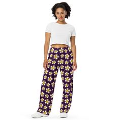 Upgrade your loungewear with our All-Over-Print Unisex Wide-Leg Pants, designed for ultimate comfort and style. These best-selling pants effortlessly blend fashion with function, making them perfect for everything from cozy pajamas to trendy streetwear. Whether you're lounging at home or stepping out, their super soft, stretchy fabric ensures comfort in every move. Crafted with premium knit mid-weight jersey fabric, these pants feature a relaxed unisex fit and an adjustable elastic waistband with a white drawstring for added comfort. Plus, the practical side pockets make them ideal for daily wear. Choose to wear them on the waist or hips for a customizable fit. The fabric's OEKO-TEX 100 standard certification guarantees safe, eco-friendly material that's gentle on the skin. Whether you're Comfy Lounge Pants, Pants Comfy, Comfy Lounge, Hippie Flowers, Cozy Pajamas, Trendy Streetwear, Pj Pants, Pants With Pockets, Pantalon Large