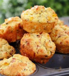 some muffins are sitting on a tray outside