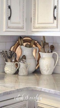 the kitchen counter is clean and ready to be used as a utensil holder