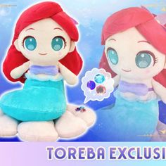 the little mermaid doll has blue eyes and is sitting next to an adorable stuffed animal