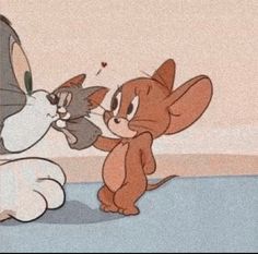 two cartoon cats are playing with each other