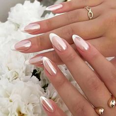 A luxurious pearl white French manicure on almond-shaped nails. The glossy, iridescent finish adds an elegant touch, perfect for weddings or formal events. Ongles Rose Pastel, Light Colored Nails, Colored Nail Tips, Nail Salon Design, Transparent Nails, Get Nails, Stick On Nails, Elegant Nails, French Tip Nails