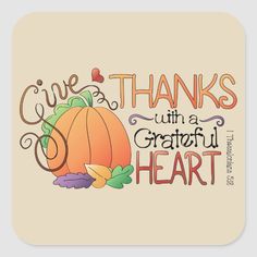 a square sticker that says give thanks with a grateful heart