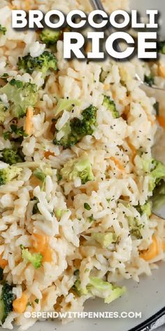 broccoli rice with carrots and other vegetables on a white plate next to a fork