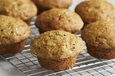 several muffins cooling on a wire rack