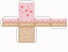 a cross made out of paper with pink squares on the top and one block in the middle