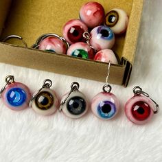 🎨 Handcrafted Artistry in Colorful Resin Eyeball Earrings These unique resin eyeball earrings are crafted with meticulous attention to detail, ensuring each pair is a true work of art. Each earring is 100% handcrafted. 🎁 Exquisite Packaging for Perfect Gifting Beautifully packaged, these earrings are ready to be presented as a thoughtful gift. Whether for a best friend, sister, daughter, or girlfriend, they make a memorable present for any occasion, especially during the festive season. 🌟 A Touch of Uniqueness for Special Occasions With their vibrant colors and intricate design, these earrings add a touch of whimsy and individuality to any outfit. They are the perfect accessory for those who appreciate handcrafted beauty and want to stand out in a crowd. Unique Earrings Weird, Weird Accessories, Earrings Weird, Eyeball Earrings, Creepy Earrings, Horror Aesthetics, Outfits Alt, Weird Earrings, Coraline Aesthetic