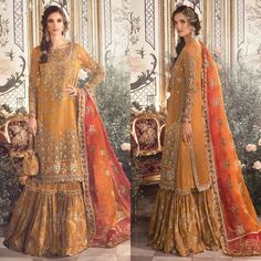 Find Your Perfect Wedding and Party Attire Orange Maria B Bridal Mehndi Gharara Shirt | Pakistani Designer Reception Walima Dress | Guest Partywear |Indian Wedding Dress Eid Gift Style your Special days like Reception, Nikkah, Walima, Engagement or Party with this beautiful and elegant luxury dress like Lehenga Choli, Maxi, Pashwas, Gown style shirt Trouser or Dupatta Salwar kameez Latest top Quality Maria B. Wedding Collection (Luxury Replica) Fabric Destails Luxury Hand Embellishment & Embroid Mehndi Gharara, Walima Outfit, Maria B Bridal, Pakistani Mehndi Dress, Embroidery Clothes, Mehndi Dresses, Mehndi Dress, Suit Salwar, Nikkah Dress