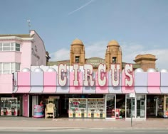 a pink and white building with the word circus on it