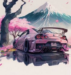 a pink car parked in front of a mountain