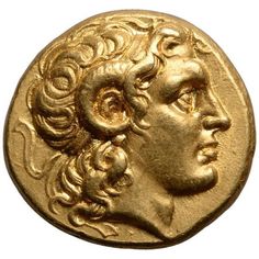 a gold coin with an image of a man's head