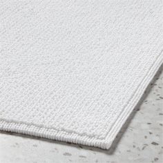 a white rug on top of a table