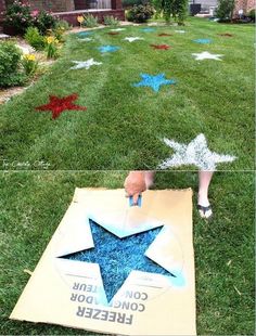 someone is painting the lawn with blue and white stars