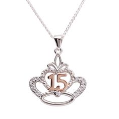 "Sterling silver quinceanera necklace for girls with a stunning tiara crown pendant and is part of our Timeless Collection. This is designed with sterling silver and accented with a rose gold-plated \"15\". This charm is special and represents her 15 years with a stone for each year on the pendant. This pendant floats on a 16-18 inch adjustable Italian wheat chain with lobster clasp. High quality keepsake necklace comes with a sweet poem and special gift box to save her timeless gift. FREE SHIPP Anniversary Silver Necklace With Crown Design, Personalized Silver Jewelry For Sweet 16, Quinceanera Necklace, Quinceanera Gifts, Quinceanera Jewelry, Quinceanera Crown, Girls Tiara, Crown Pendant, Necklace For Girls